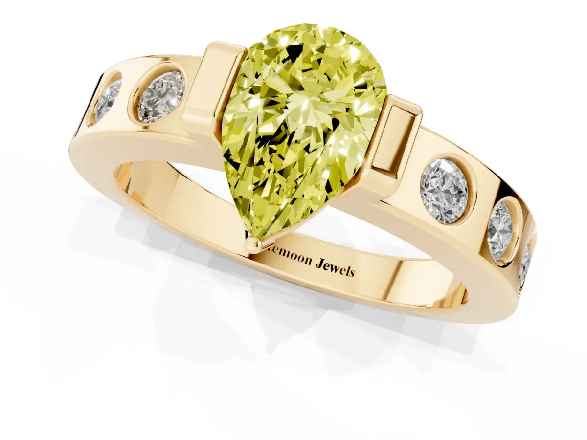 Fancy Yellow Pear Cut Brilliant Channel-Set Diamond Ring with Bezel Prong Setting Yellow gold