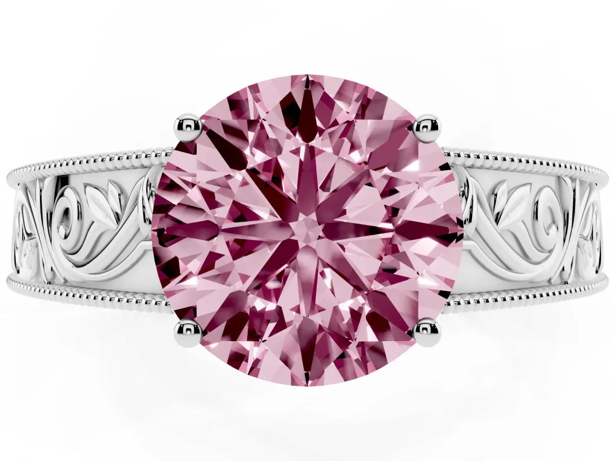 Fancy Pink Round Cut Diamond Solitaire Ring with Engraved Band and Four-Prong Setting White gold