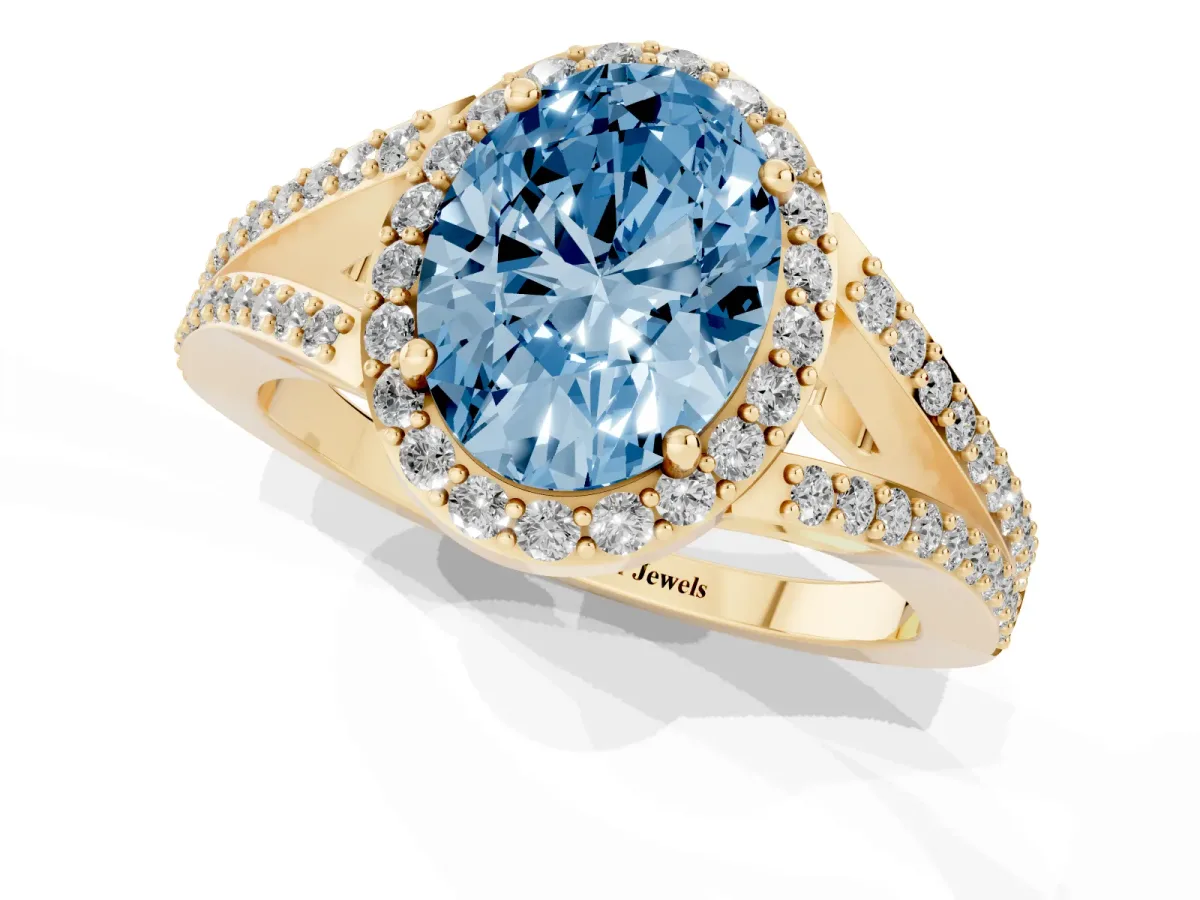 Fancy Blue Oval Cut Halo Split Shank Diamond Ring with Prong Setting Yellow gold