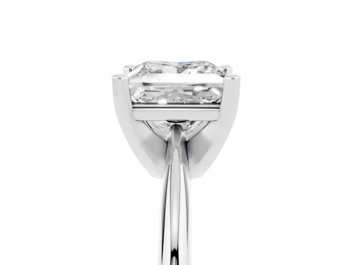 Princess Cut Cut Solitaire Ring with Four-Prong Setting on a Classic Band Platinum