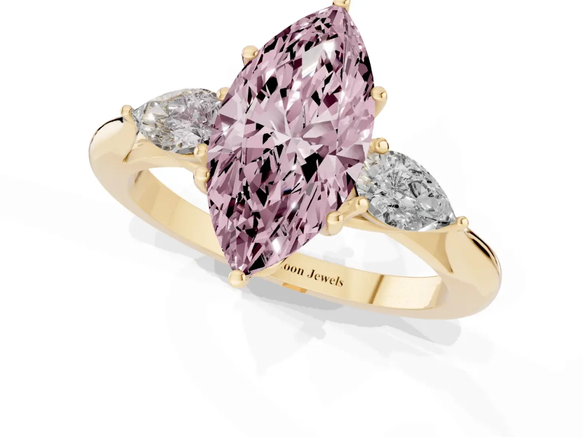 Fancy Pink Three-Stone Marquise Cut Brilliant Diamond Solitaire Ring with Tapered Band and Four-Prong Setting Yellow gold