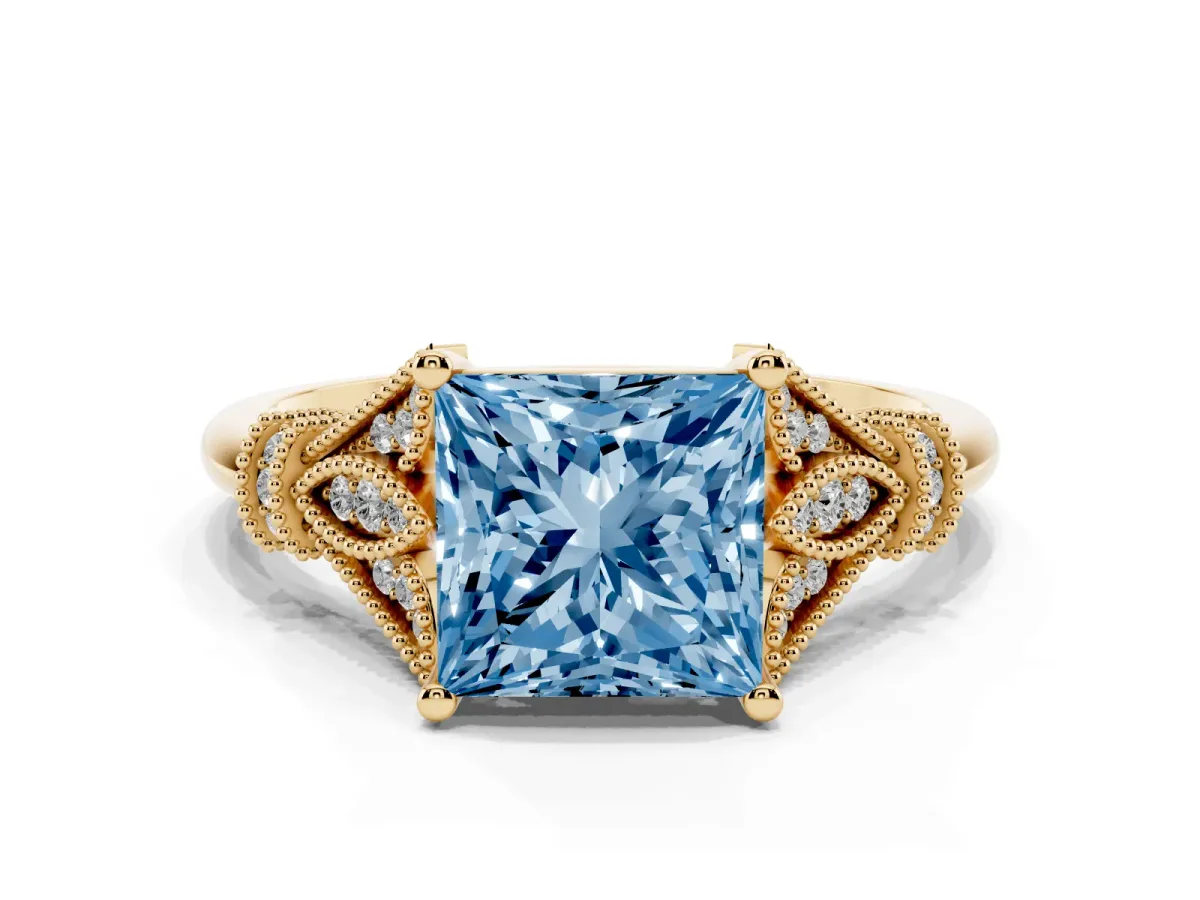 Fancy Blue Princess Cut Diamond Solitaire Ring with Floral Filigree and Pave Accents Yellow gold