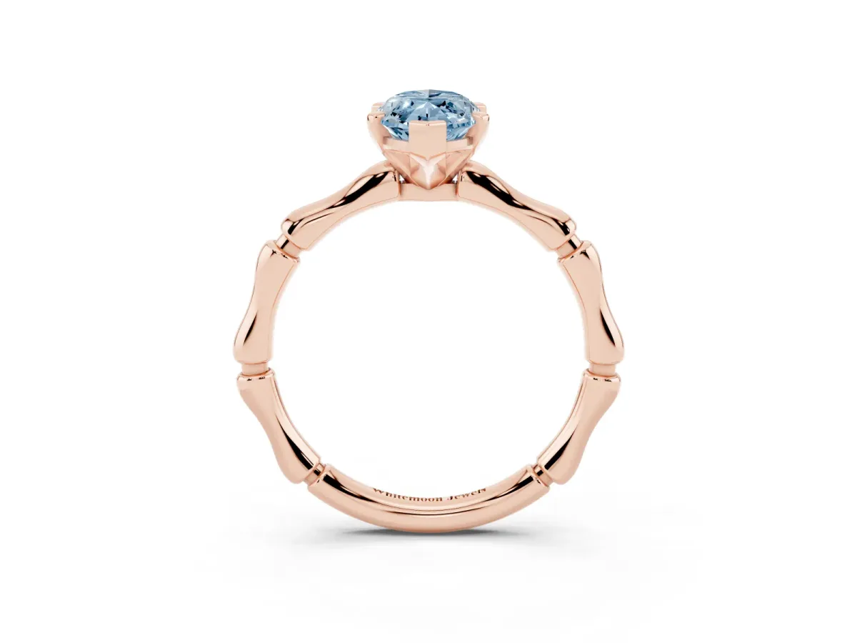Fancy Blue Marquise Cut Solitaire Diamond Ring with Bamboo Band and Four-Prong Setting Rose gold