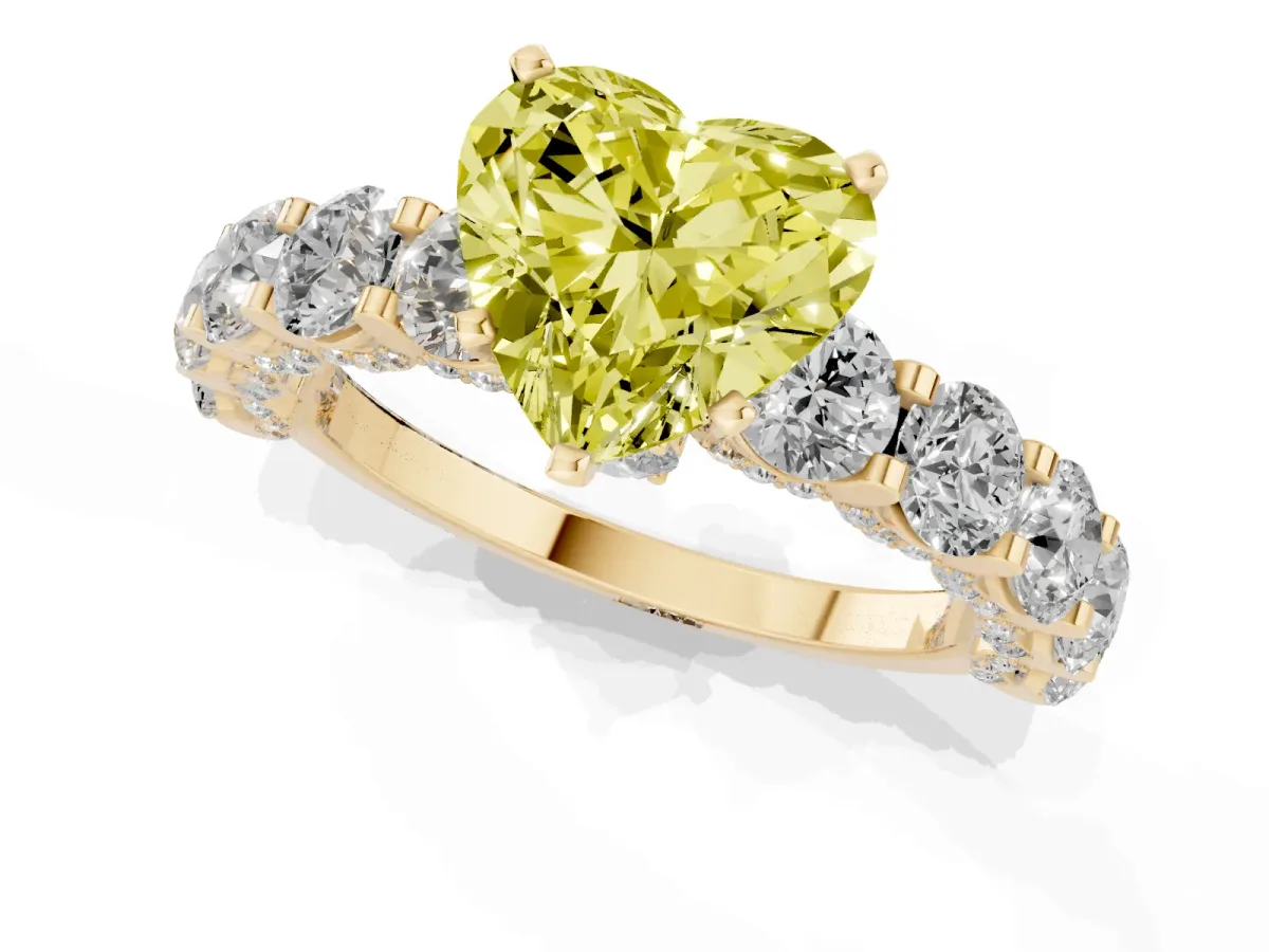 Fancy Yellow Heart Cut Diamond Side Stone Engagement Ring with Four-Prong Setting Yellow gold