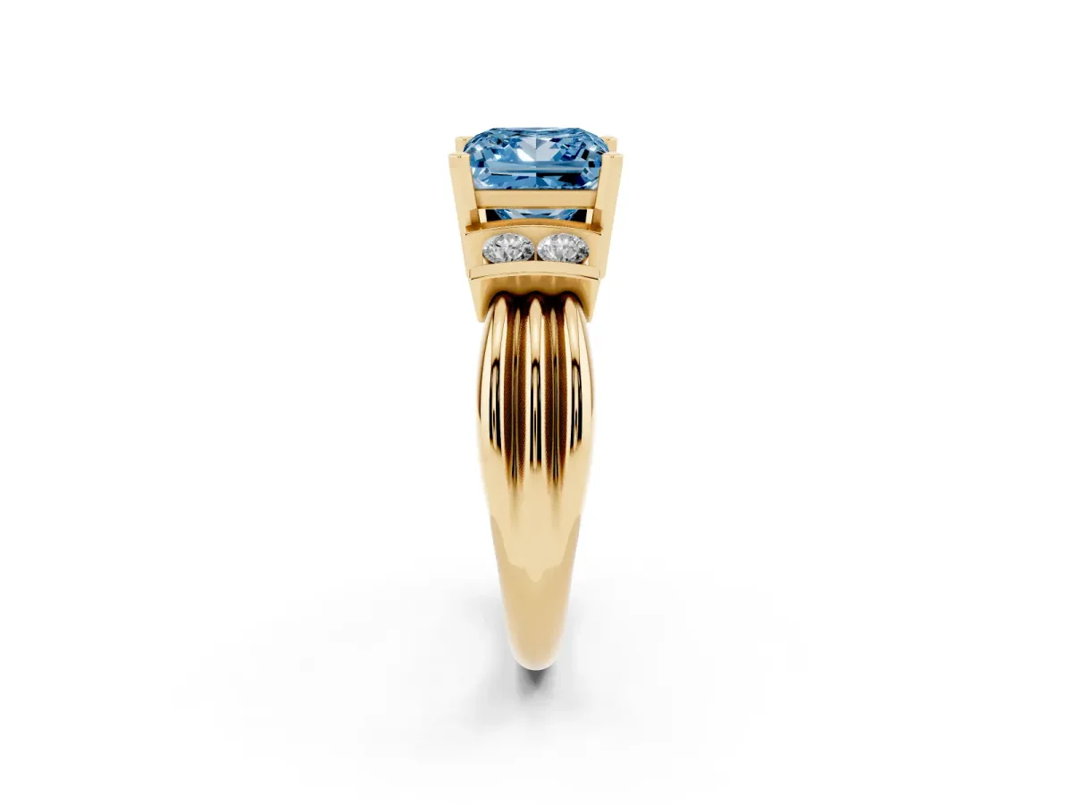 Fancy Blue Princess Cut Cut Three-Stone Channel Set Ring with Bar Prongs Yellow gold