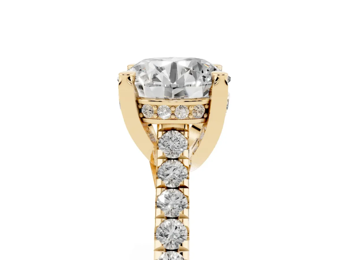 Round Cut Brilliant Diamond Solitaire with Pavé Band and Four-Prong Setting Yellow gold