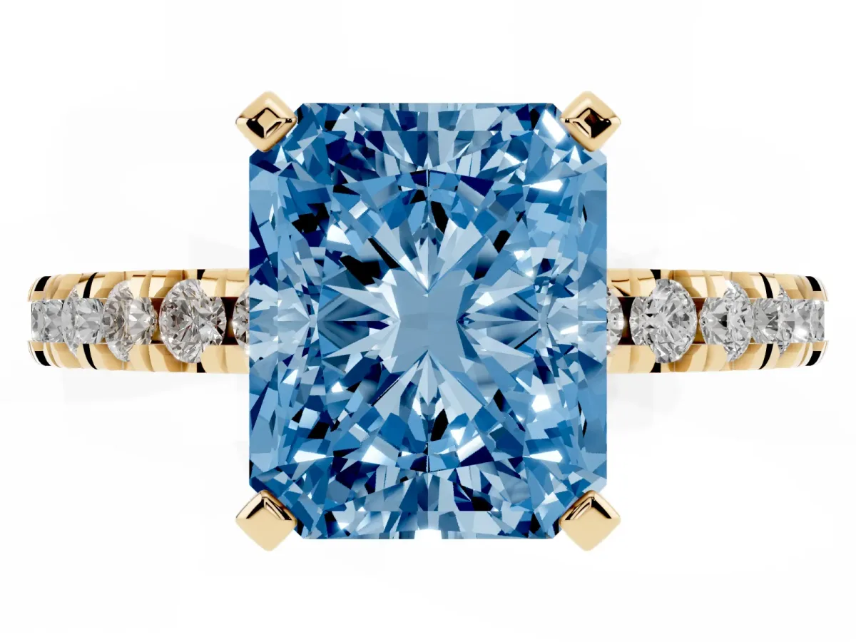 Fancy Blue Radiant Cut Diamond Pavé Band Solitaire with Four-Prong Setting Yellow gold