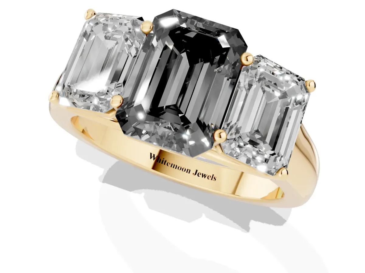 Fancy Black Emerald Cut Three-Stone Diamond Ring with Prong Setting on a Classic Band Yellow gold