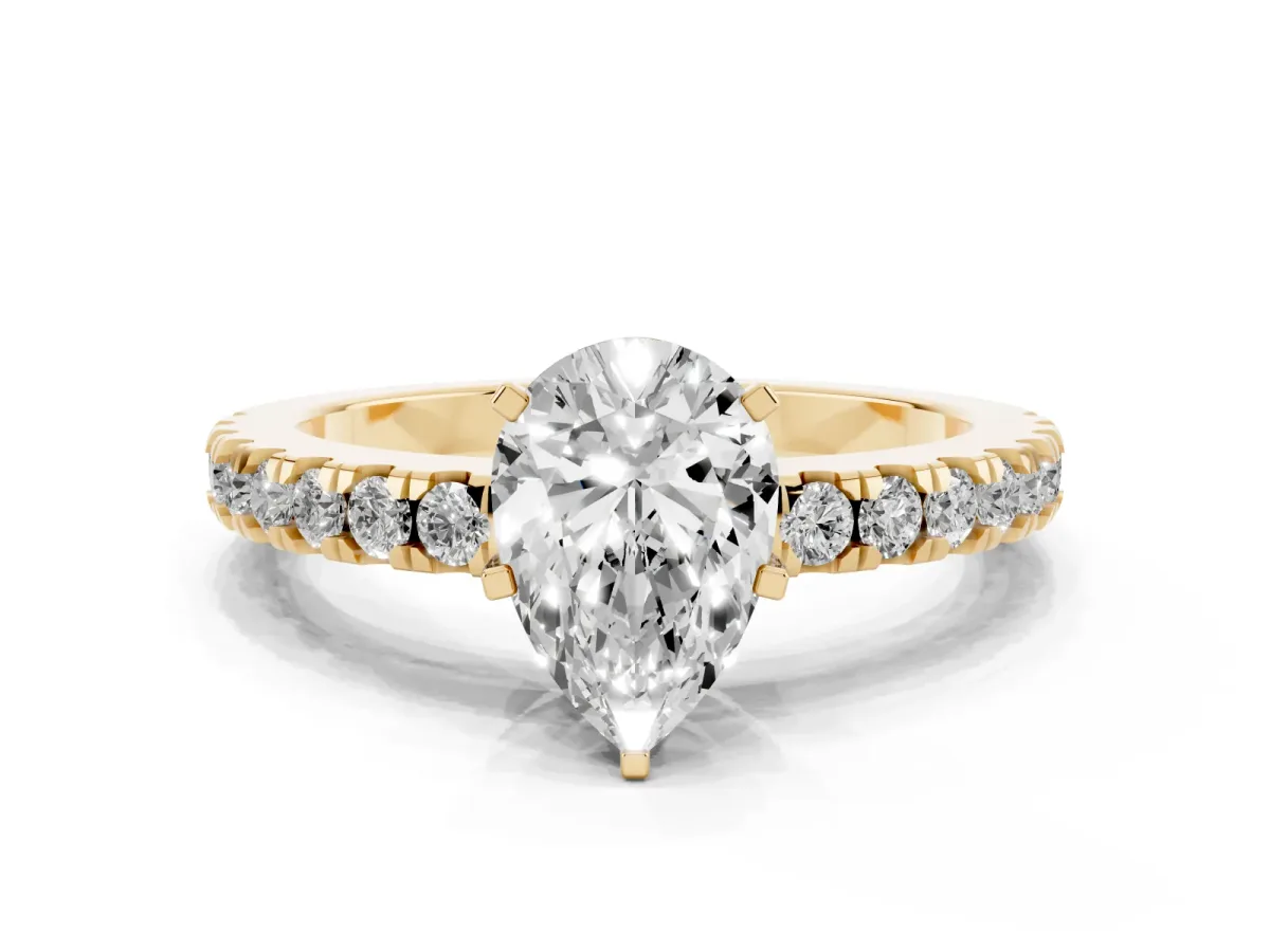 Pear Cut Solitaire Diamond with Pavé Band and Four-Prong Setting Yellow gold