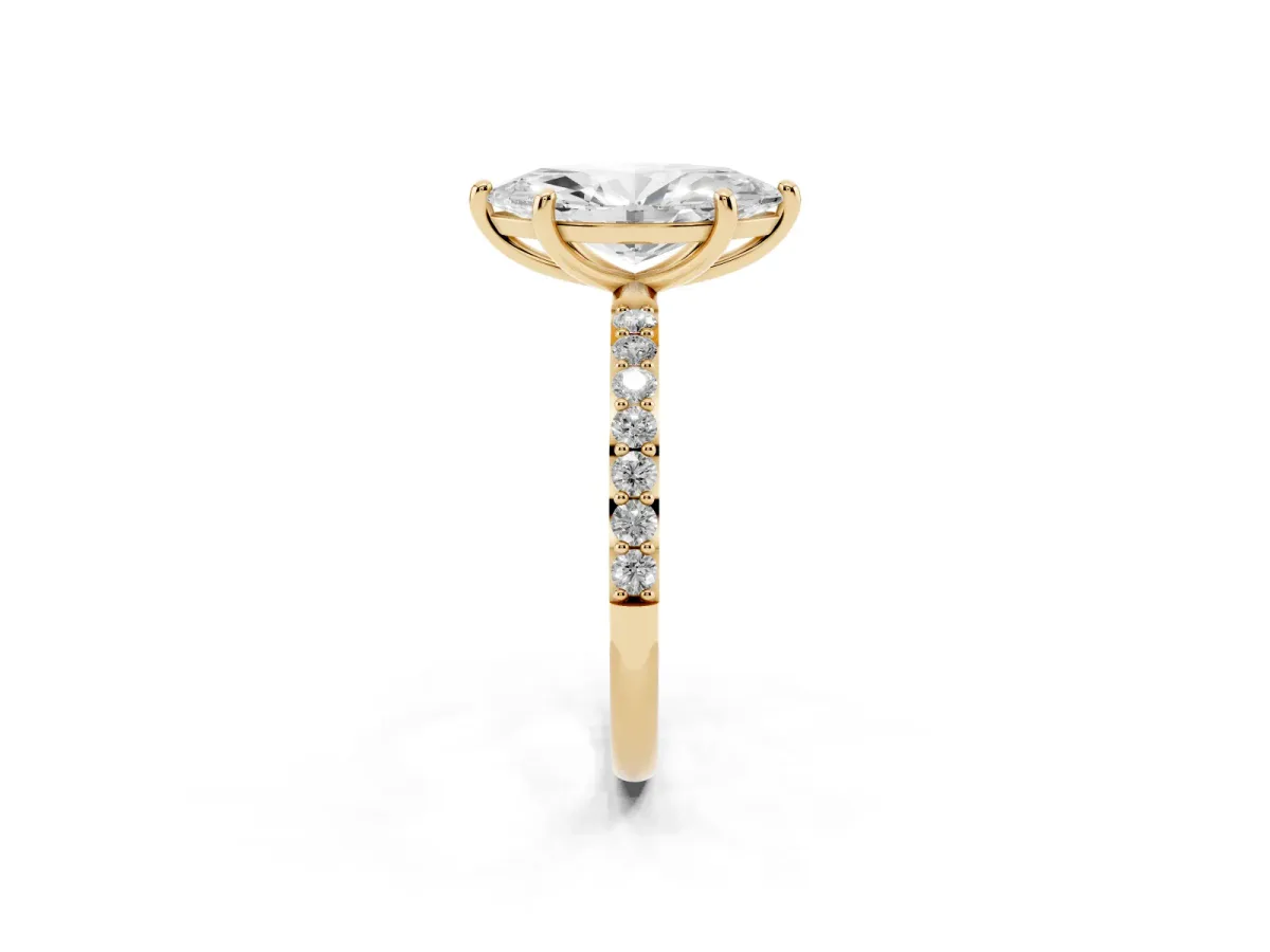 Marquise Cut Diamond Solitaire Ring with Round Pavé Band and Prong Setting Yellow gold