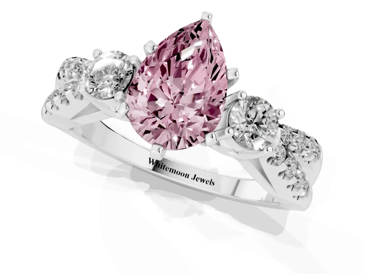 Fancy Pink Pear Cut Diamond Three-Stone Ring with Pavé Split Shank and Four-Prong Setting Silver