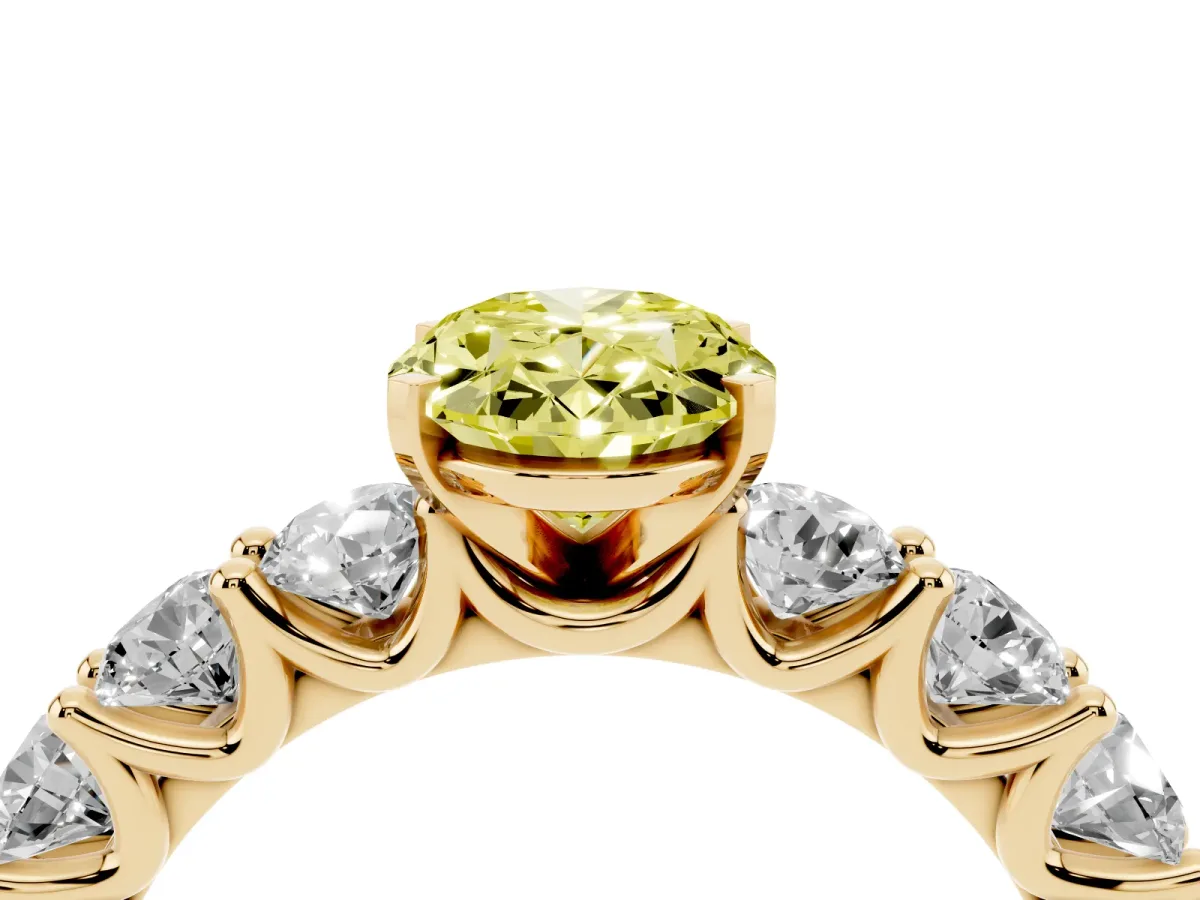 Fancy Yellow Oval Cut Diamond Prong Setting with Side Stones on a Pave Band Yellow gold