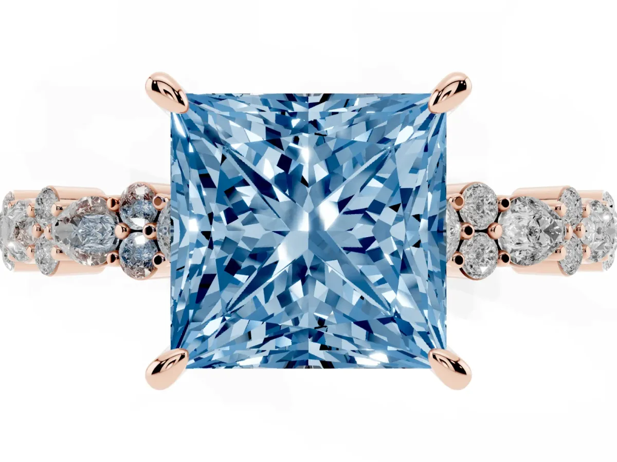 Fancy Blue Princess Cut Diamond Side Stone Solitaire Ring with Round and Four-Prong Setting Rose gold