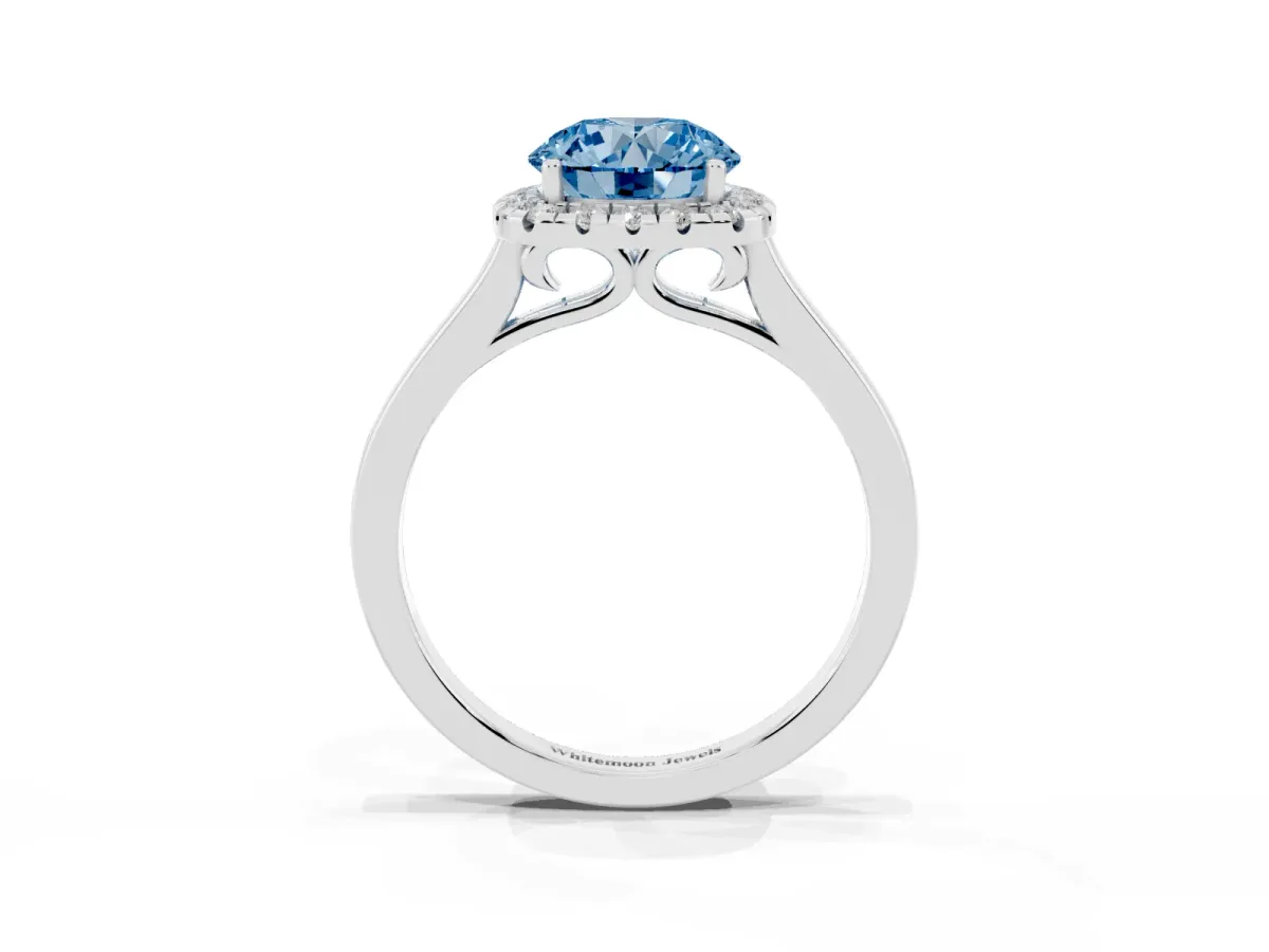 Fancy Blue Round Cut Halo Round Diamond Solitaire Ring with Pavé Band and Four-Prong Setting Silver