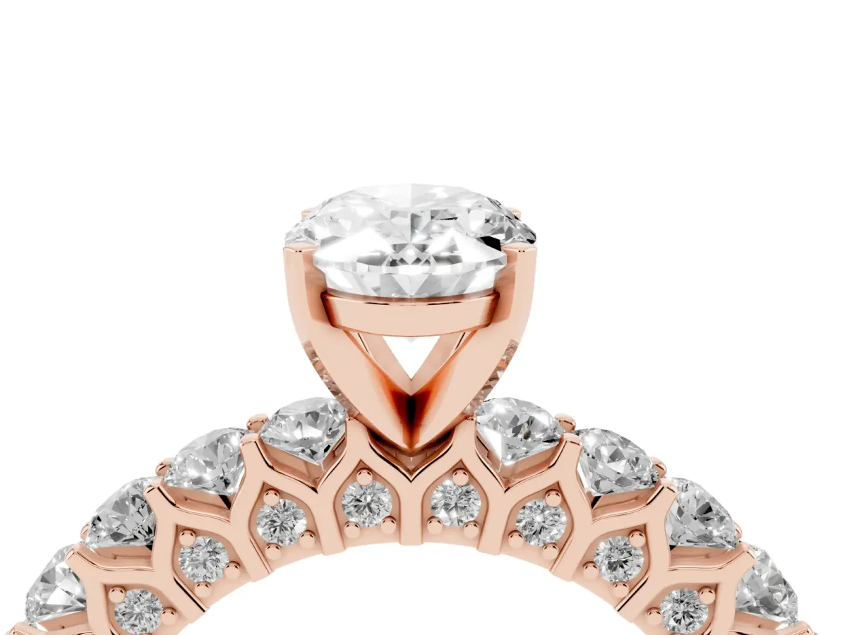 Oval Cut Diamond Solitaire Ring with Shared Prong Pavé Band and Four-Prong Setting Rose gold