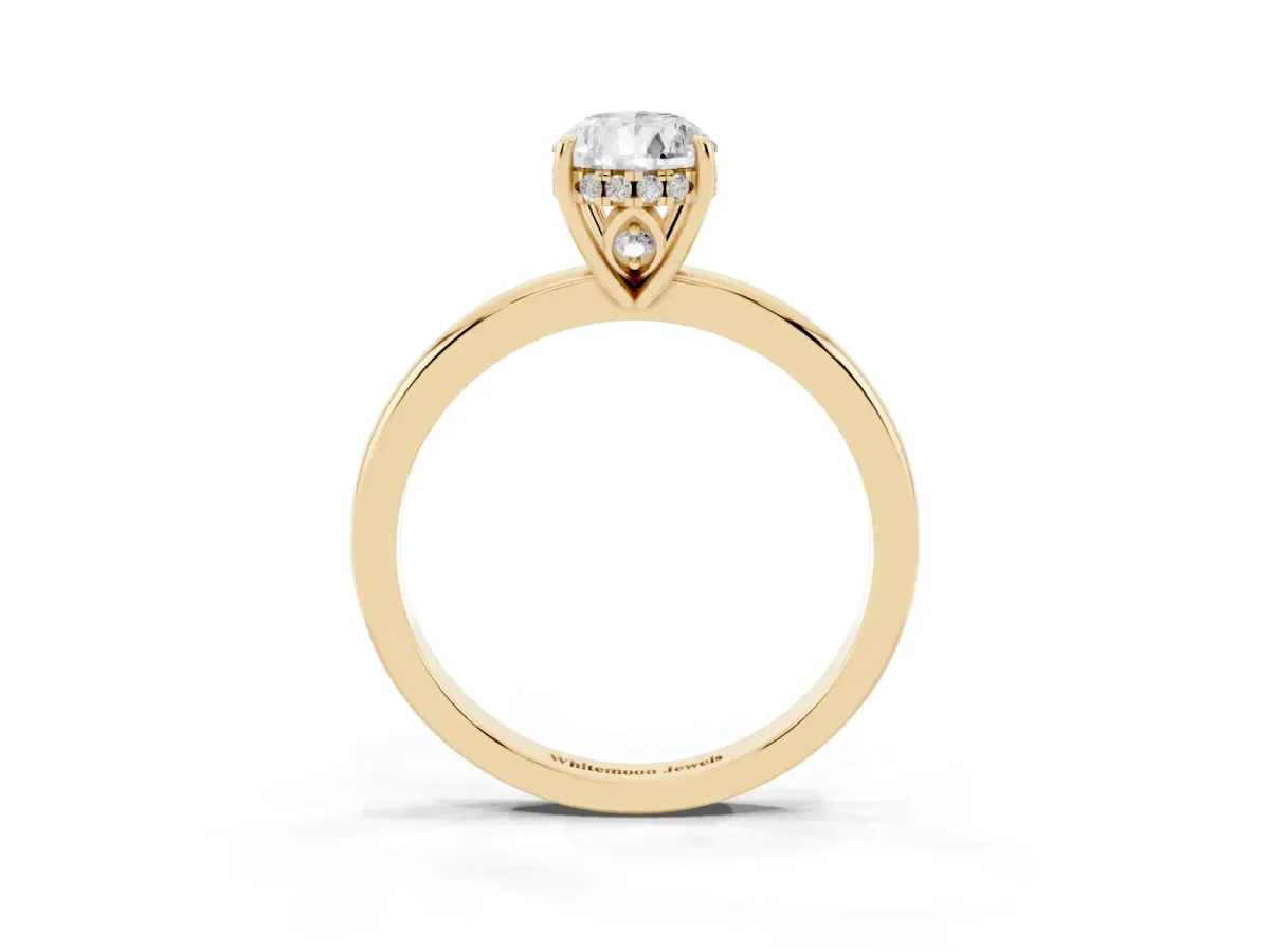 Pear Cut Solitaire Diamond Ring with Prong Setting and Plain Band Yellow gold