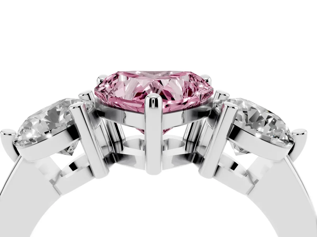 Fancy Pink Three-Stone Heart Cut Brilliant Cut Solitaire Ring with Prong Setting on a Classic Band White gold