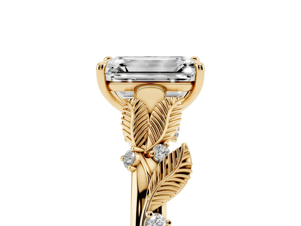 Emerald Cut Diamond Solitaire Ring with Leaf Motif Band and Four-Prong Setting Yellow gold