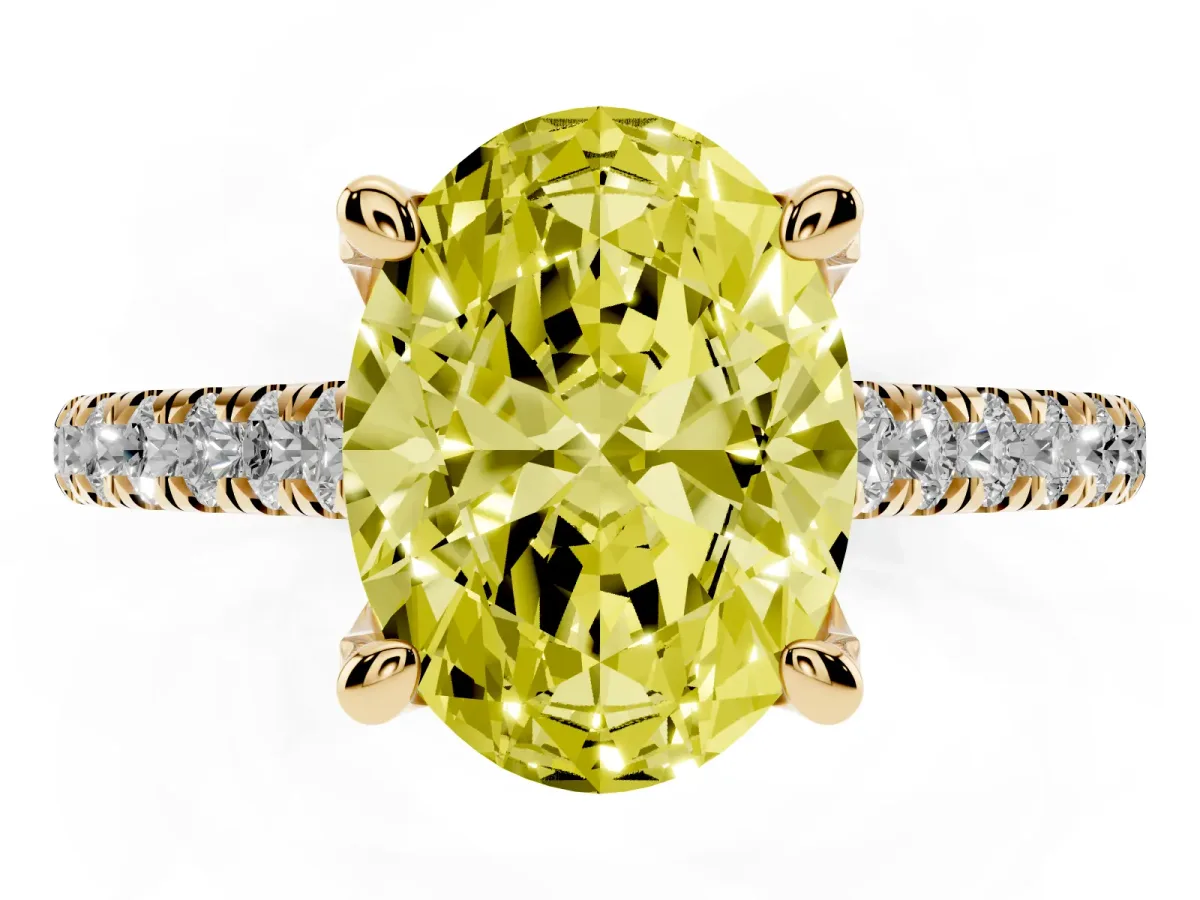Fancy Yellow Oval Cut Brilliant Diamond Solitaire with Pavé Band and Four-Prong Setting Yellow gold