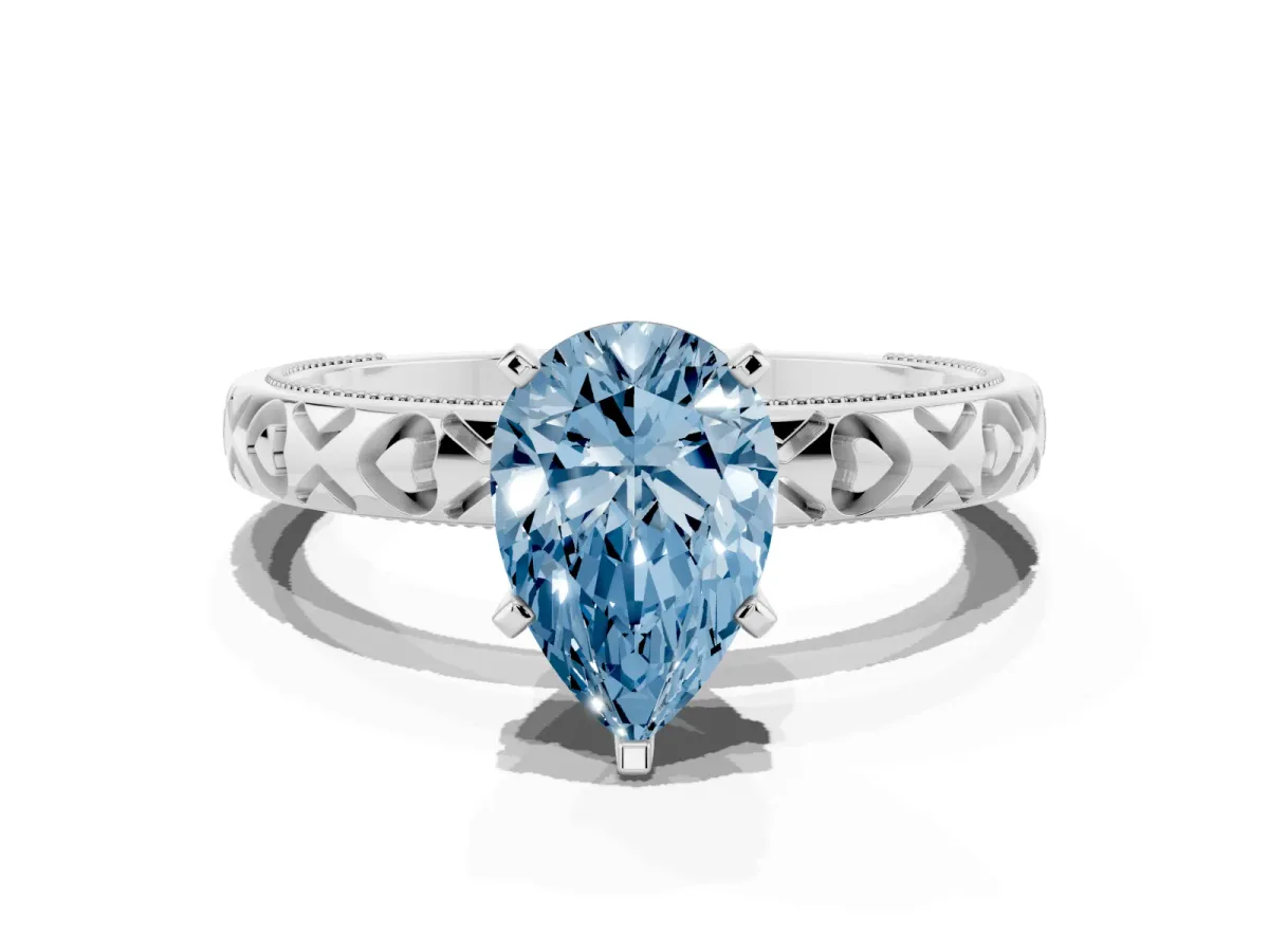 Fancy Blue Pear Cut Solitaire Diamond Engagement Ring with XO Engraved Band and Four-Prong Setting White gold