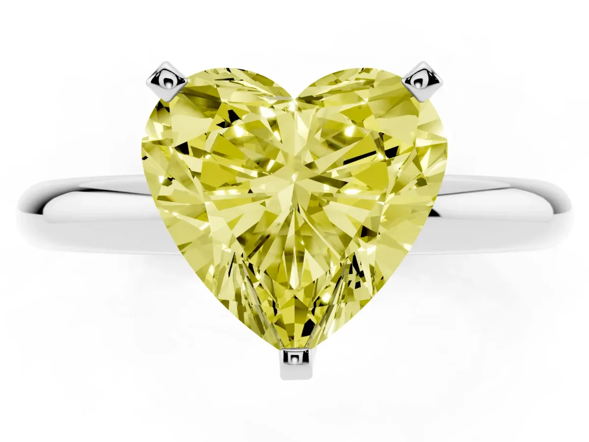 Fancy Yellow Heart Cut Diamond Solitaire Engagement Ring with Round Band and Four-Prong Setting Platinum