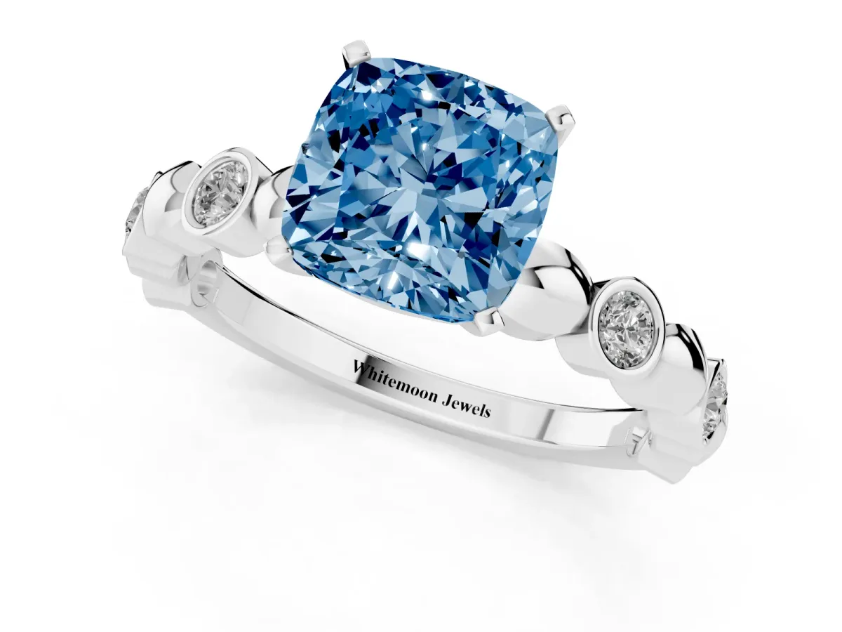 Fancy Blue Cushion Cut Solitaire Bezel-Set Diamond Ring with Beaded Band and Four-Prong Setting Silver