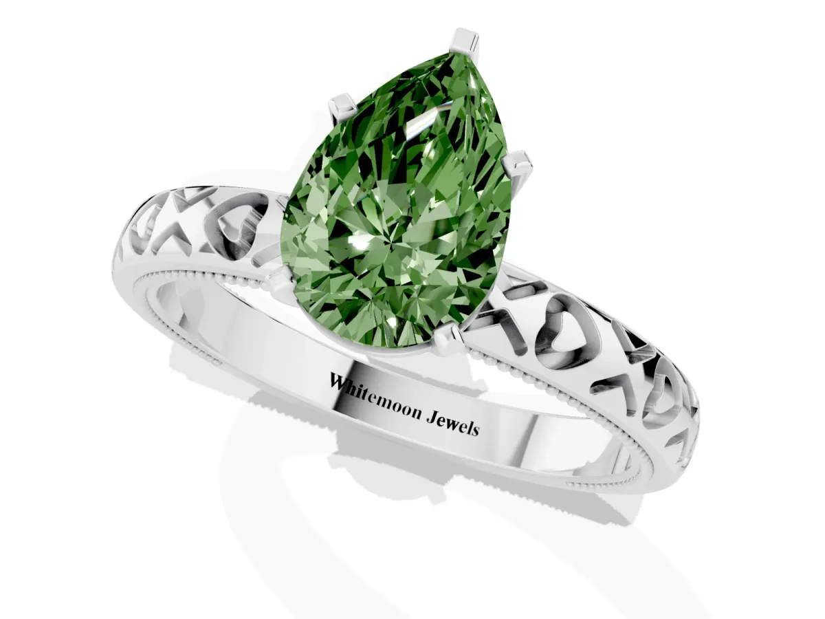 Fancy Green Pear Cut Solitaire Diamond Engagement Ring with XO Engraved Band and Four-Prong Setting Platinum