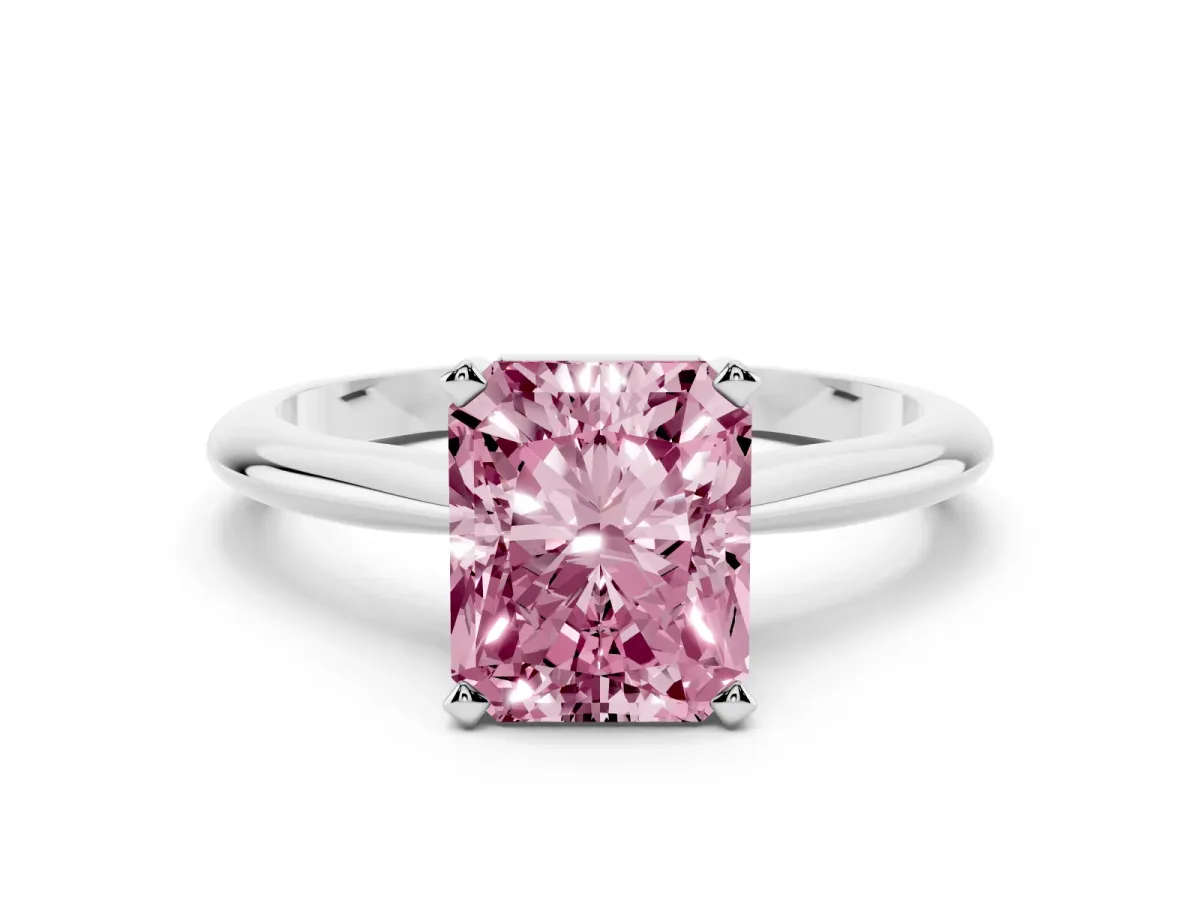Fancy Pink Radiant Cut Cut Solitaire Ring with Four-Prong Setting on a Classic Band Silver