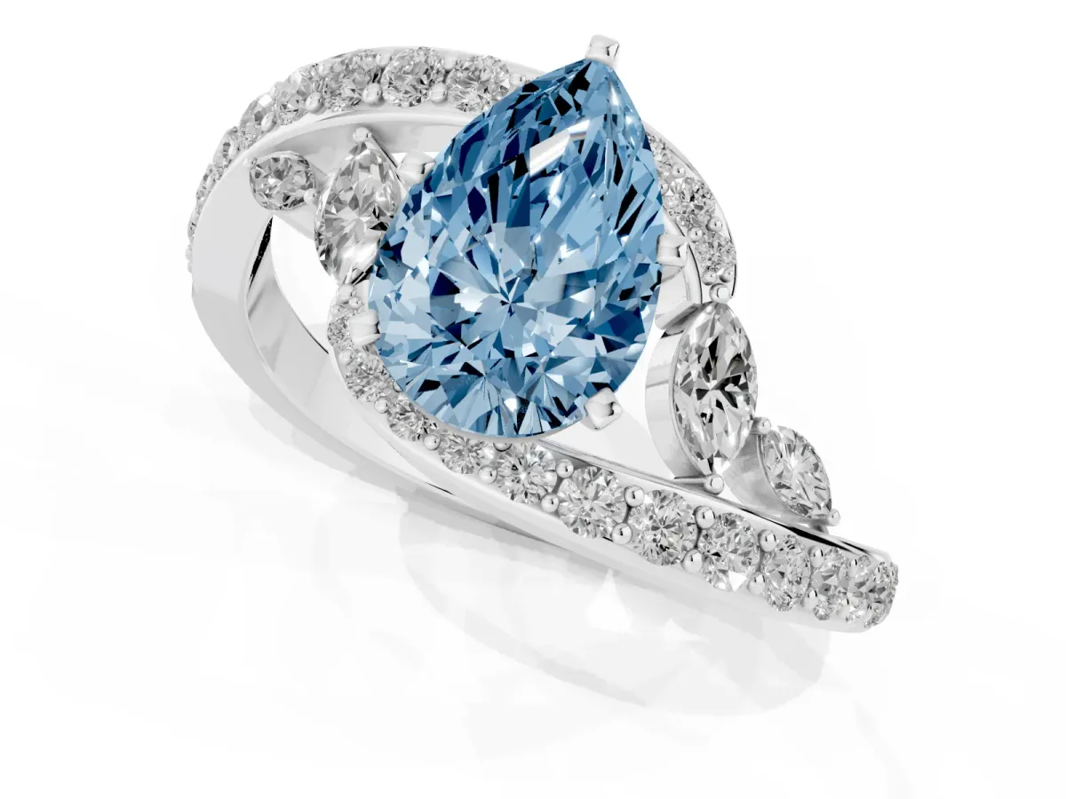 Fancy Blue Pear Cut Solitaire with Pavé Twist Band and Four-Prong Setting Silver