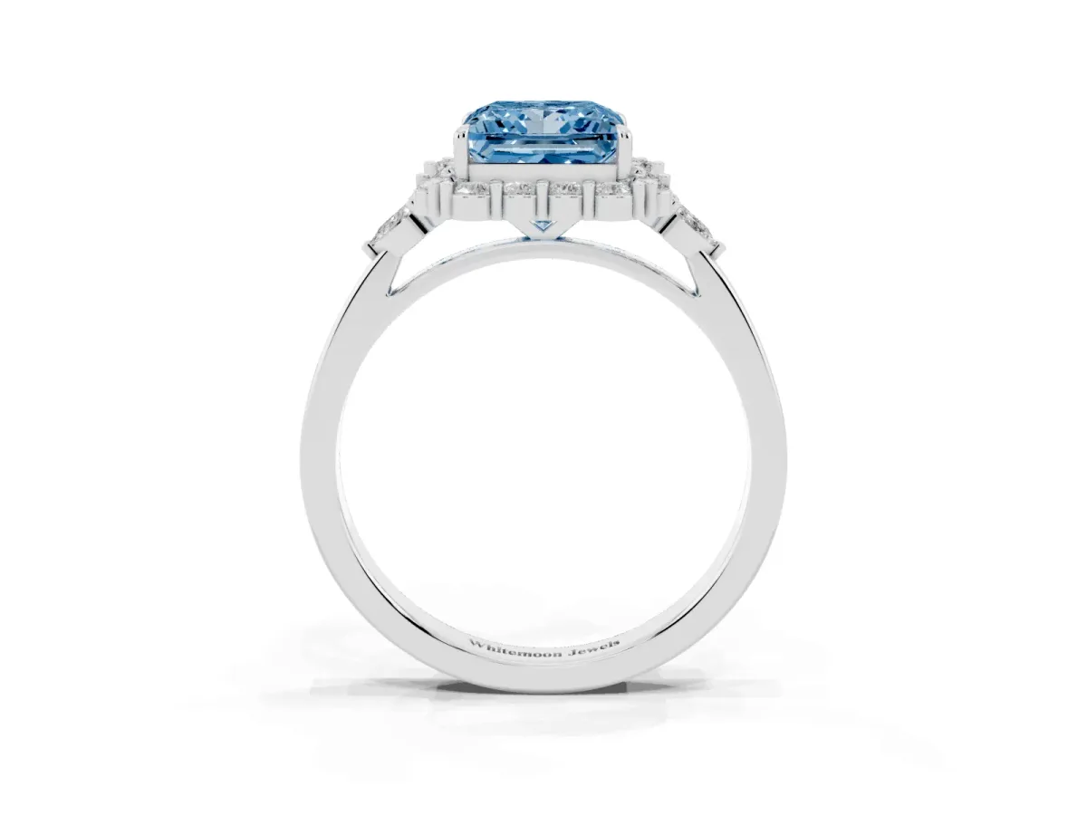 Fancy Blue Princess Cut Diamond Halo Ring with Pear Side Stones and Prong Setting Silver