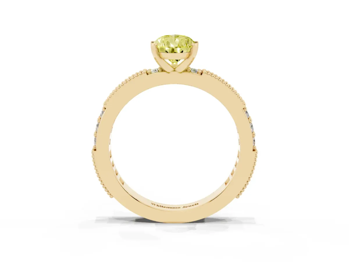Fancy Yellow Pear Cut Solitaire with Pavé Band and Four-Prong Setting Yellow gold
