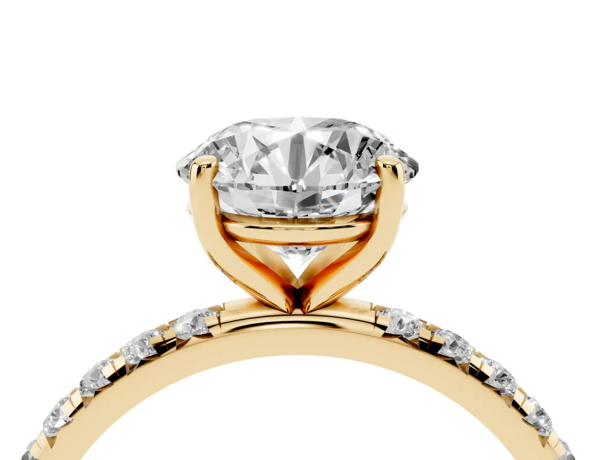 Round Cut Cut Diamond Solitaire Ring with Micro Pave Band and Four Prong Setting Yellow gold
