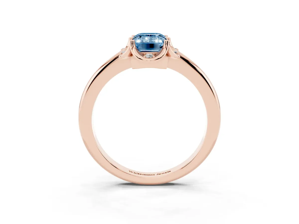 Fancy Blue Emerald Cut Halo Diamond Ring with Round Cluster Setting, Solitaire Band, and Four-Prong Setting Rose gold