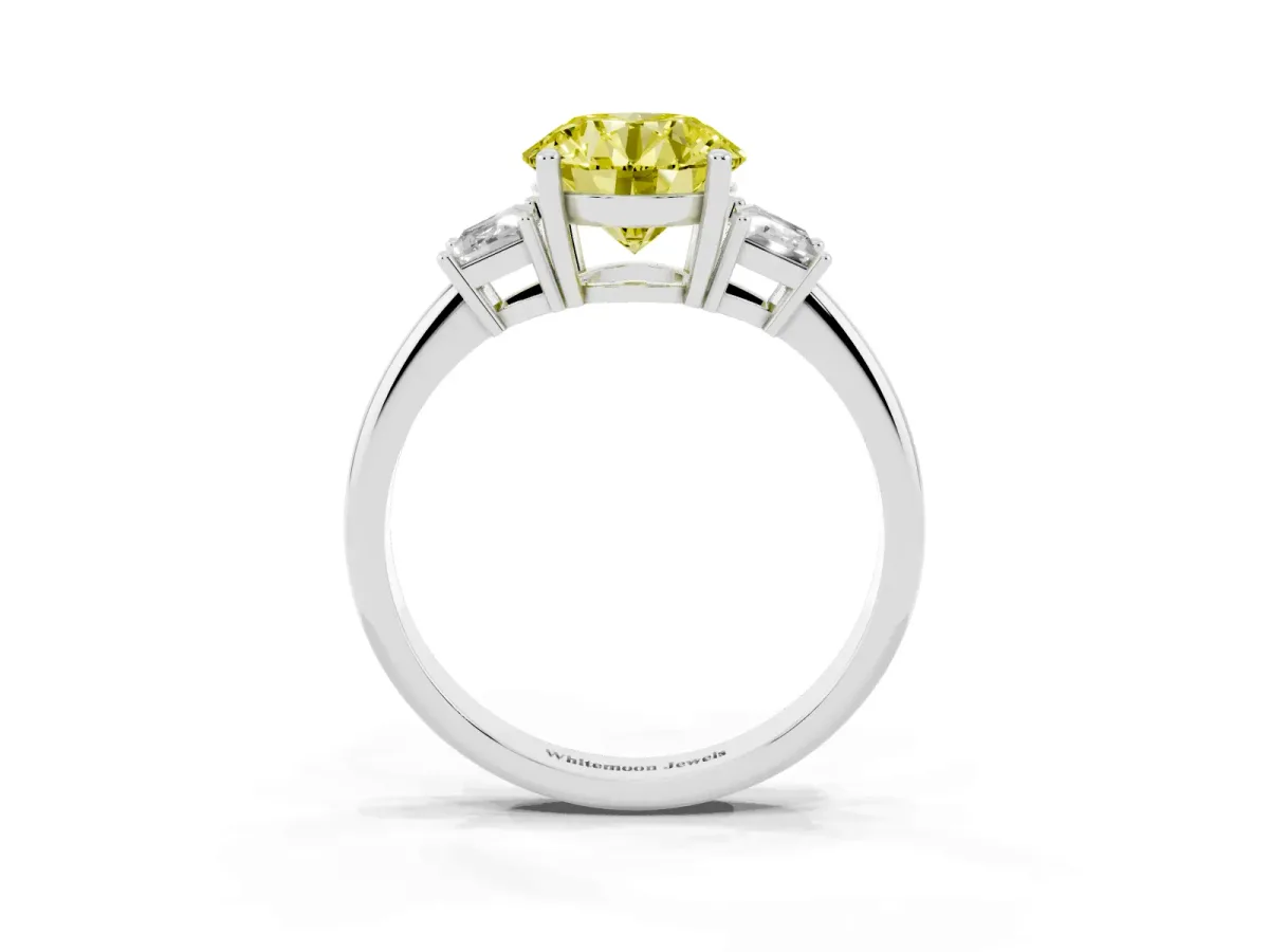 Fancy Yellow Round Cut Diamond Three-Stone Ring with Trapezoid Side Stones and Prong Setting Platinum