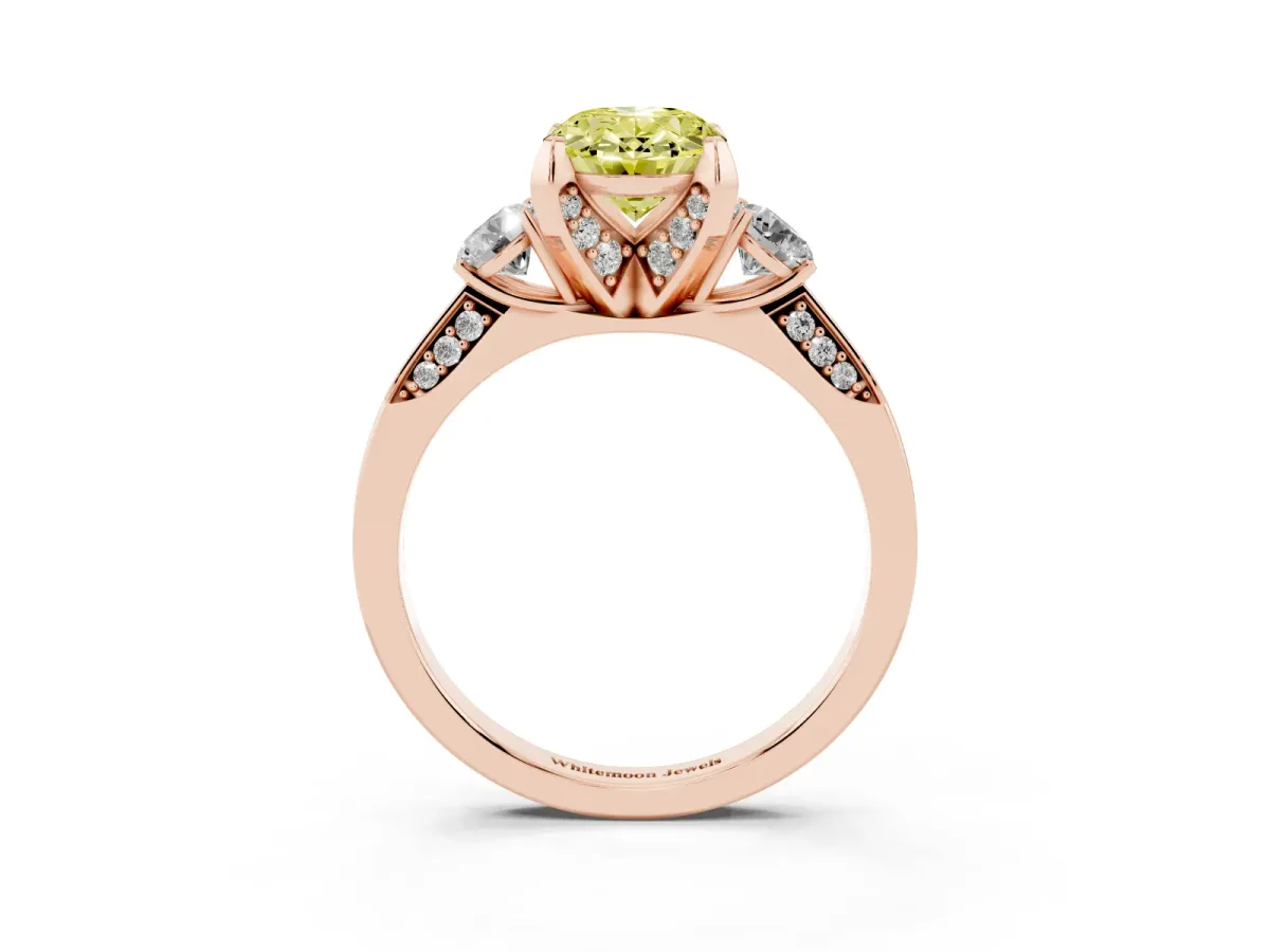 Fancy Yellow Oval Cut Brilliant Three-Stone Diamond Ring with Pavé Band and Four-Prong Setting Rose gold