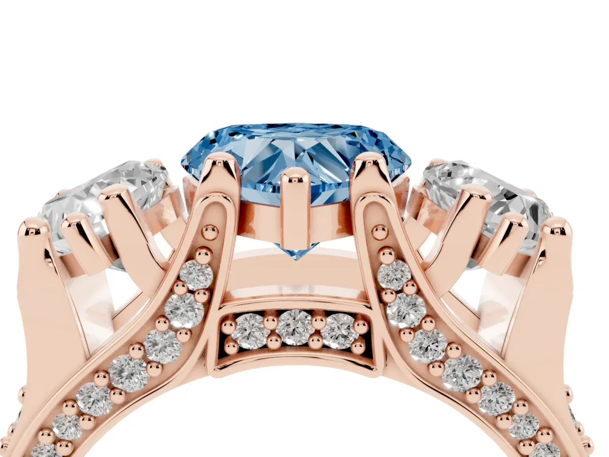 Fancy Blue Heart Cut Diamond Three-Stone Ring with Channel Set Band and Four-Prong Setting Rose gold