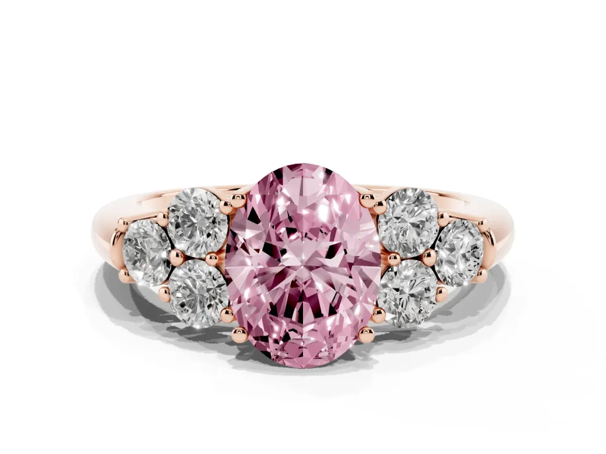 Fancy Pink Oval Cut Cut Diamond Cluster Ring with Round Accent Stones and Prong Setting on a Classic Band Rose gold