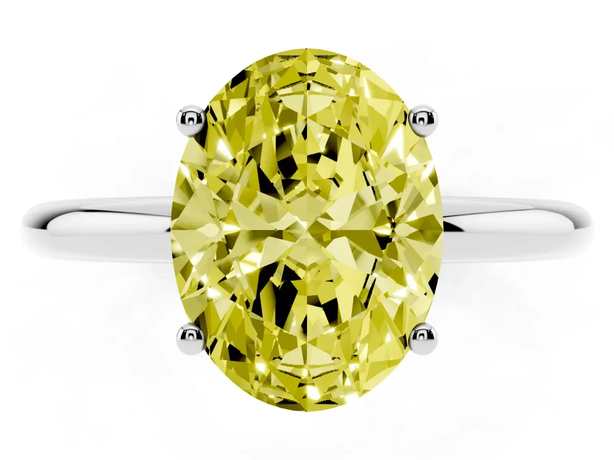 Fancy Yellow Oval Cut Cut Solitaire Engagement Ring with Four-Prong Setting and Classic Band Silver