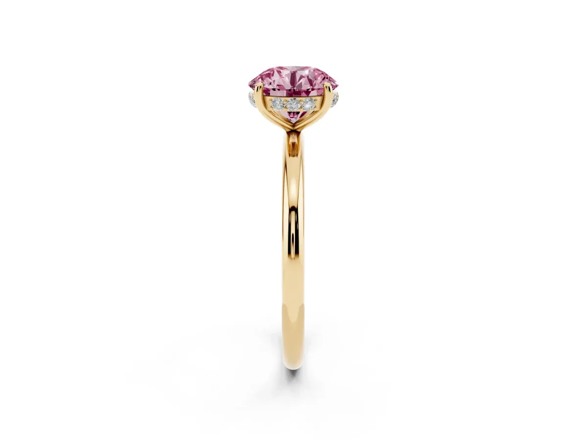 Fancy Pink Round Cut Solitaire Diamond Ring with a Classic Band and Four-Prong Setting Yellow gold