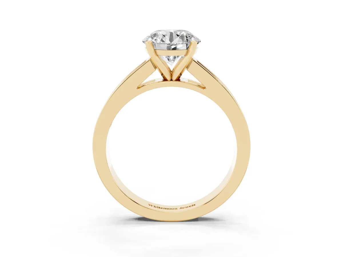 Round Cut Solitaire Diamond Ring with Channel-Set Band and Four-Prong Setting Yellow gold