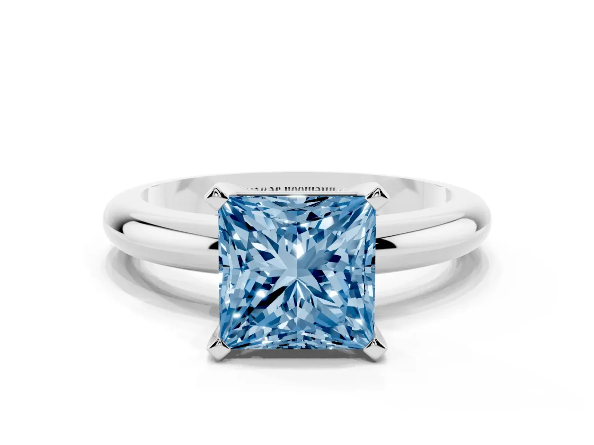 Fancy Blue Princess Cut Diamond Solitaire Engagement Ring with Round Band and Four-Prong Setting Silver