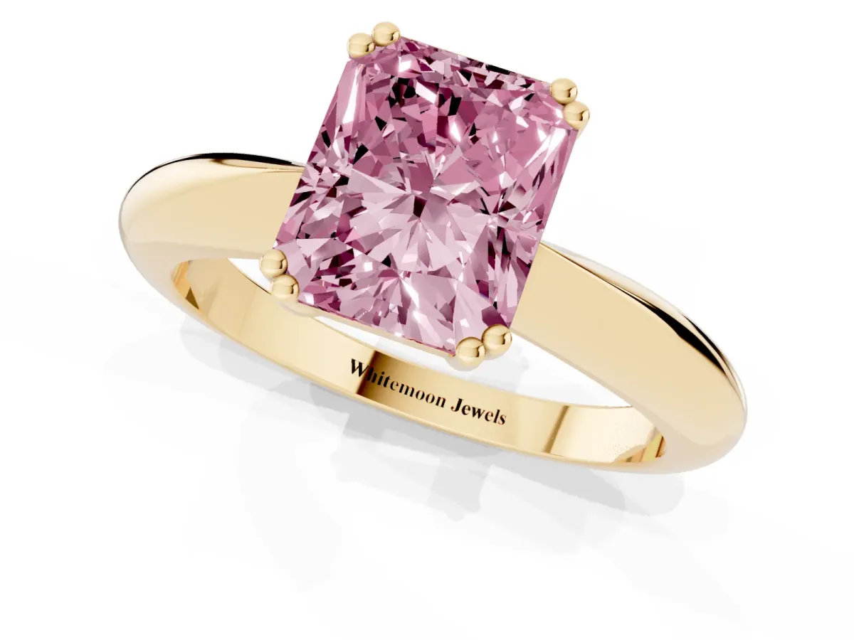 Fancy Pink Radiant Cut Cut Solitaire Engagement Ring with Tapered Band and Four-Prong Setting Yellow gold