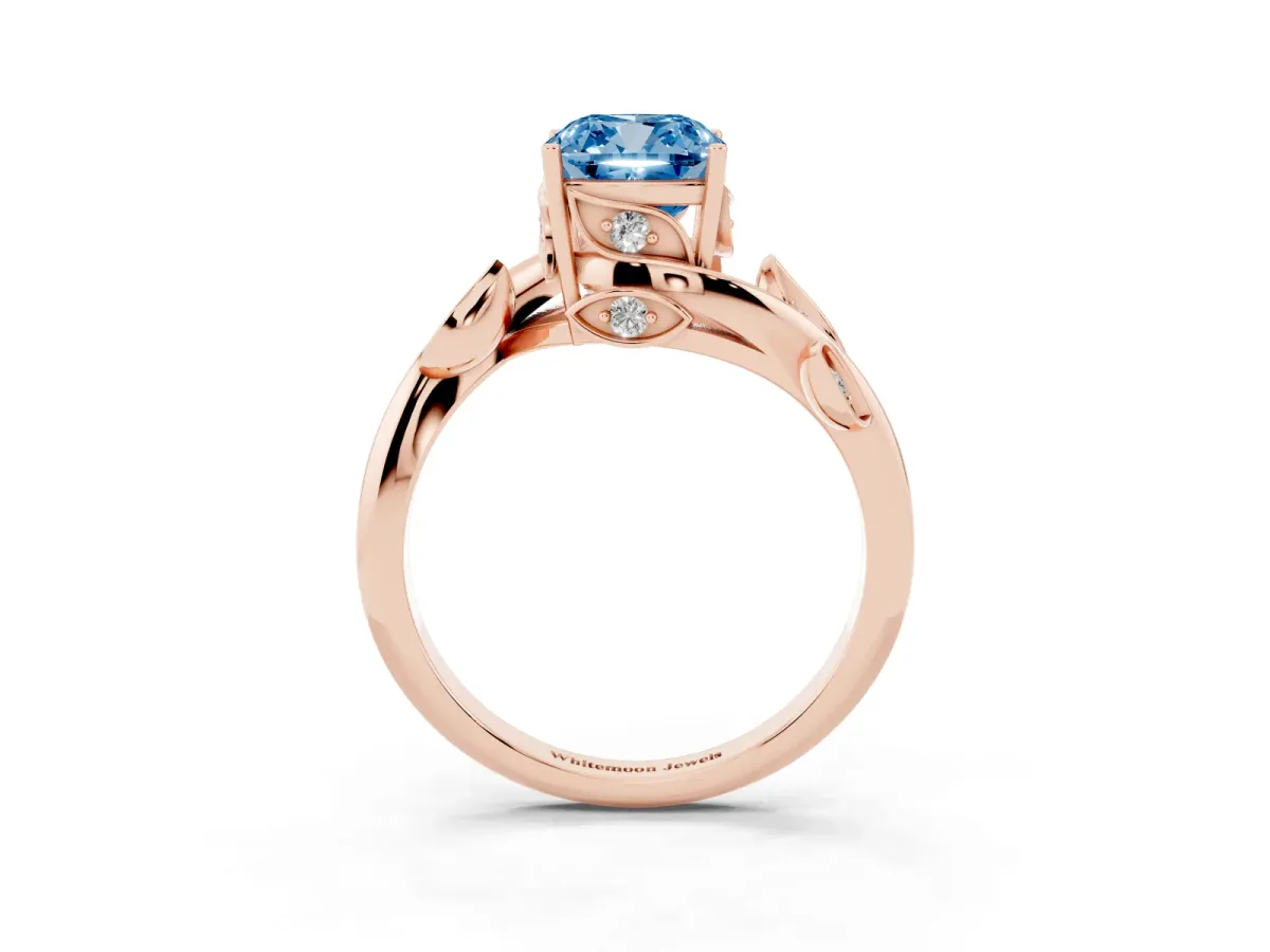 Fancy Blue Cushion Cut Solitaire Twist Engagement Ring with Leaf Accents and Prong Setting Rose gold