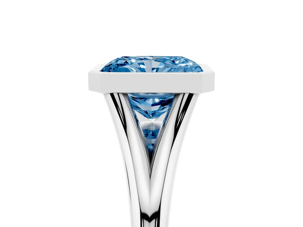 Fancy Blue Bezel Set Radiant Cut Cut Solitaire Ring with Tapered Band Silver