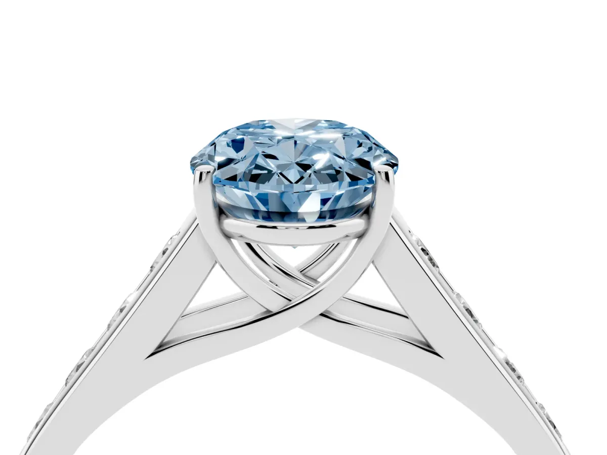 Fancy Blue Oval Cut Brilliant Channel-Set Solitaire Ring with Four-Prong Setting Silver