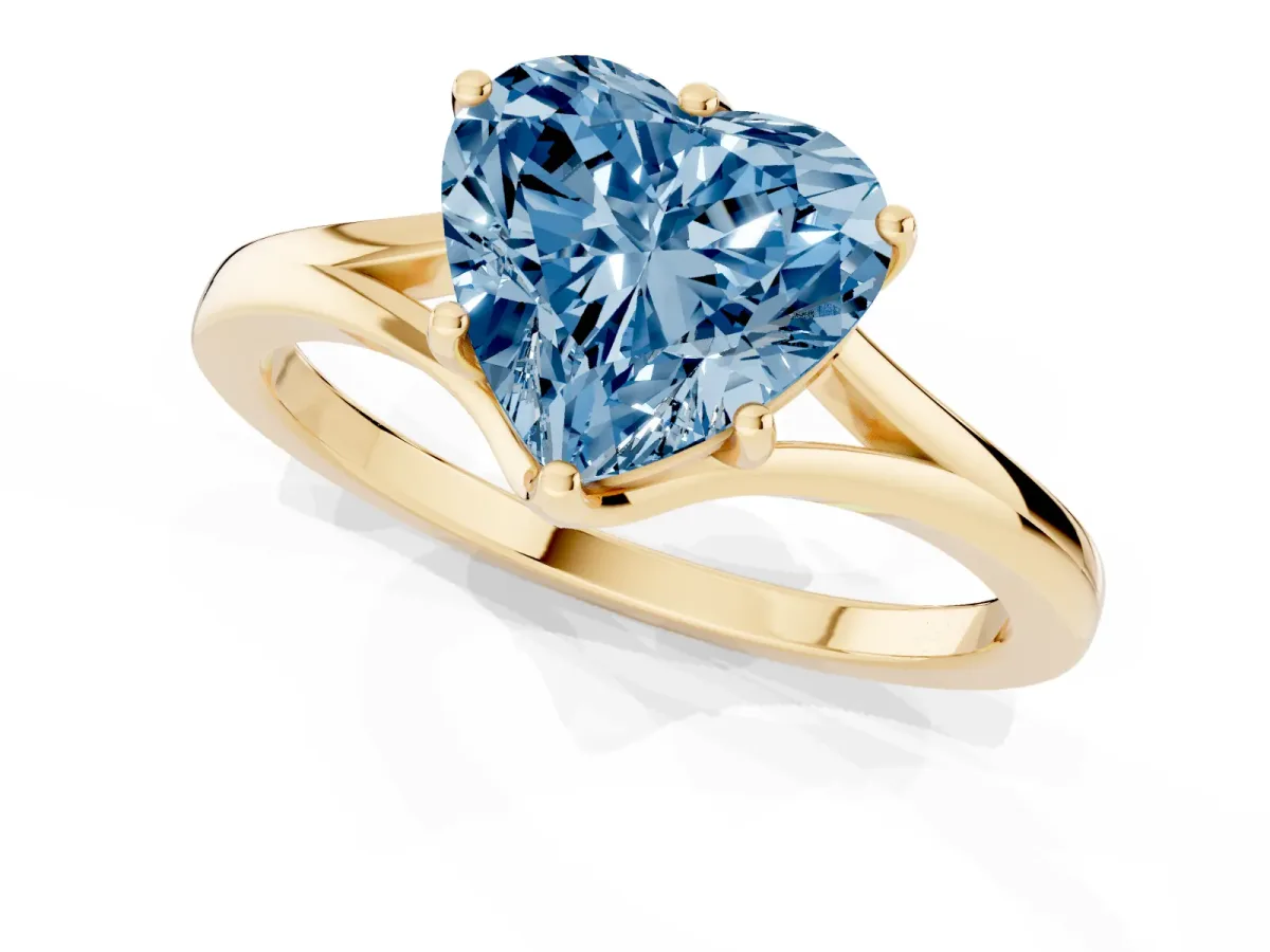 Fancy Blue Heart Cut Solitaire Diamond Ring with Six-Prong Setting and Tapered Band Yellow gold