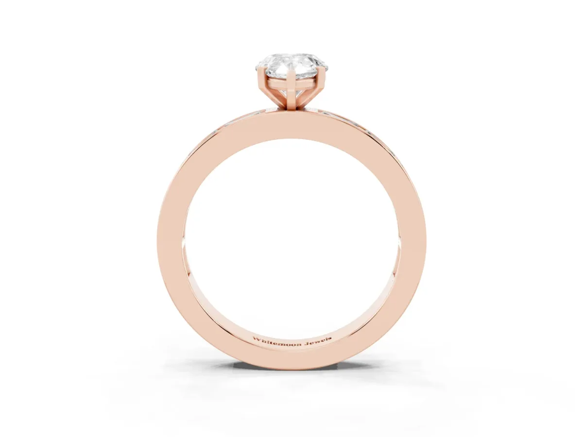 Pear Cut Solitaire Diamond Ring with Channel-Set Baguette Band and Four-Prong Setting Rose gold