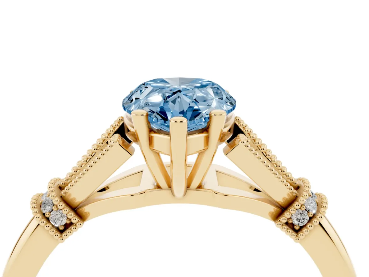 Fancy Blue Pear Cut Diamond Solitaire Ring with Floral Filigree and Pave Accents Yellow gold