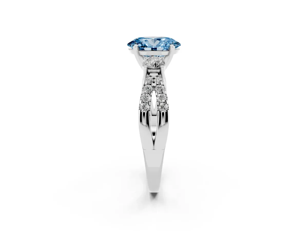 Fancy Blue Oval Cut Diamond Three-Stone Ring with Pavé Split Shank and Four-Prong Setting Silver
