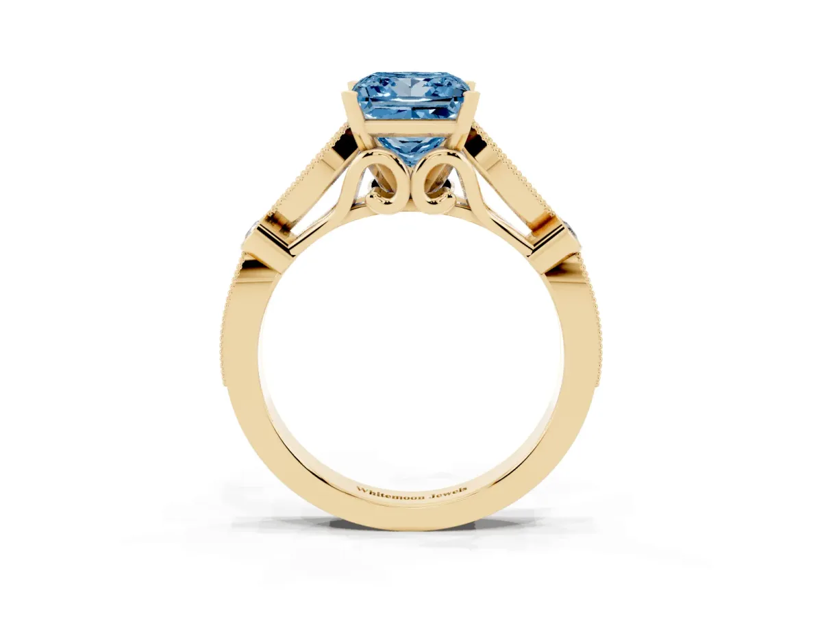 Fancy Blue Princess Cut Cut Diamond with Milgrain Marquise and Bezel Accents on a Solitaire Band with Prong Setting Yellow gold